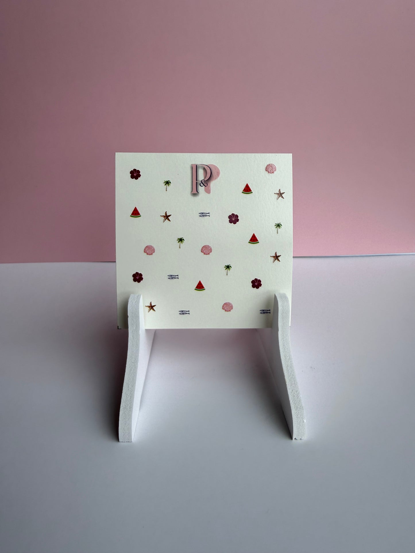 The 'sunburnt' decal sheet on a white shelf 