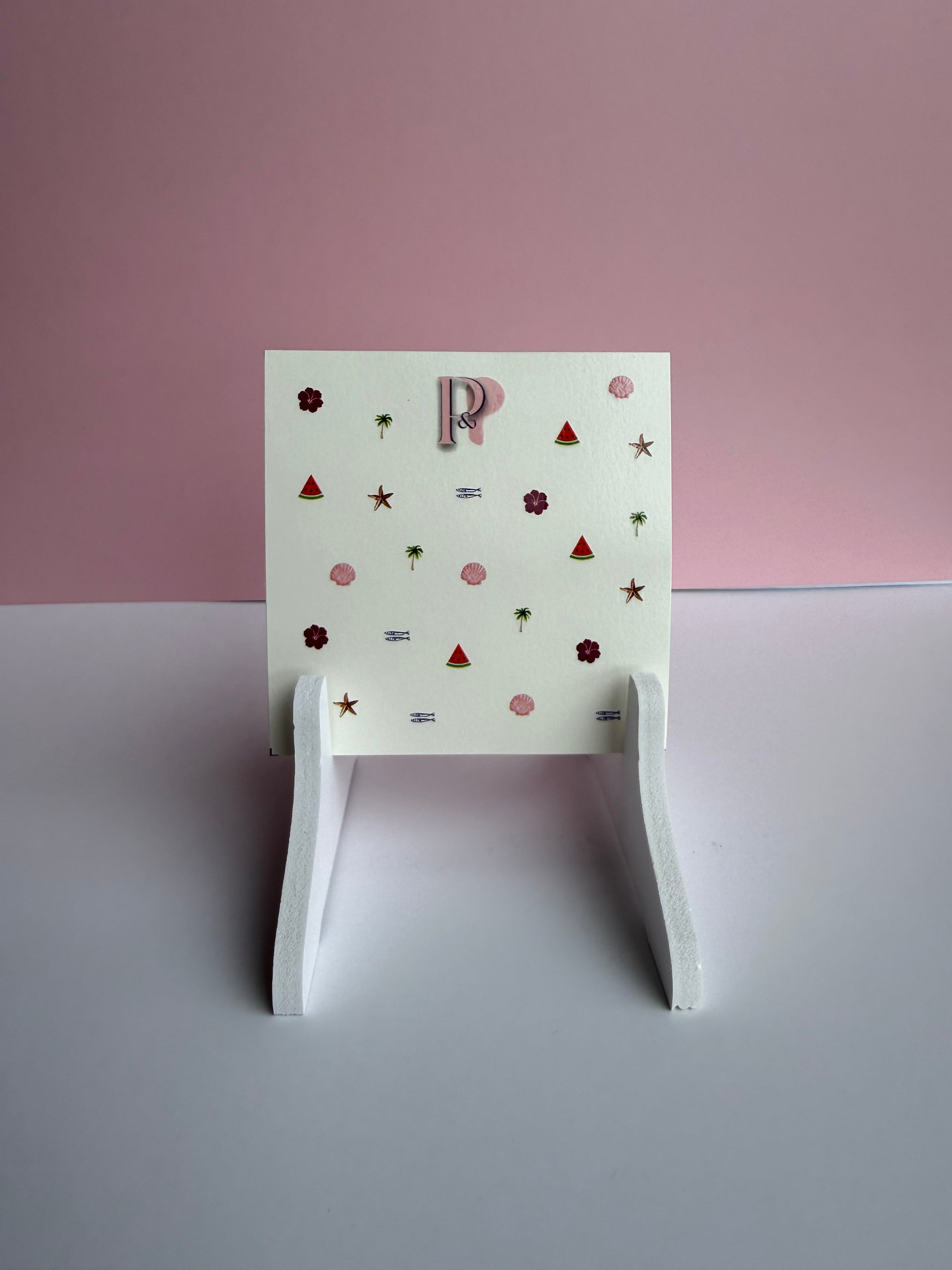 The 'sunburnt' decal sheet on a white shelf 