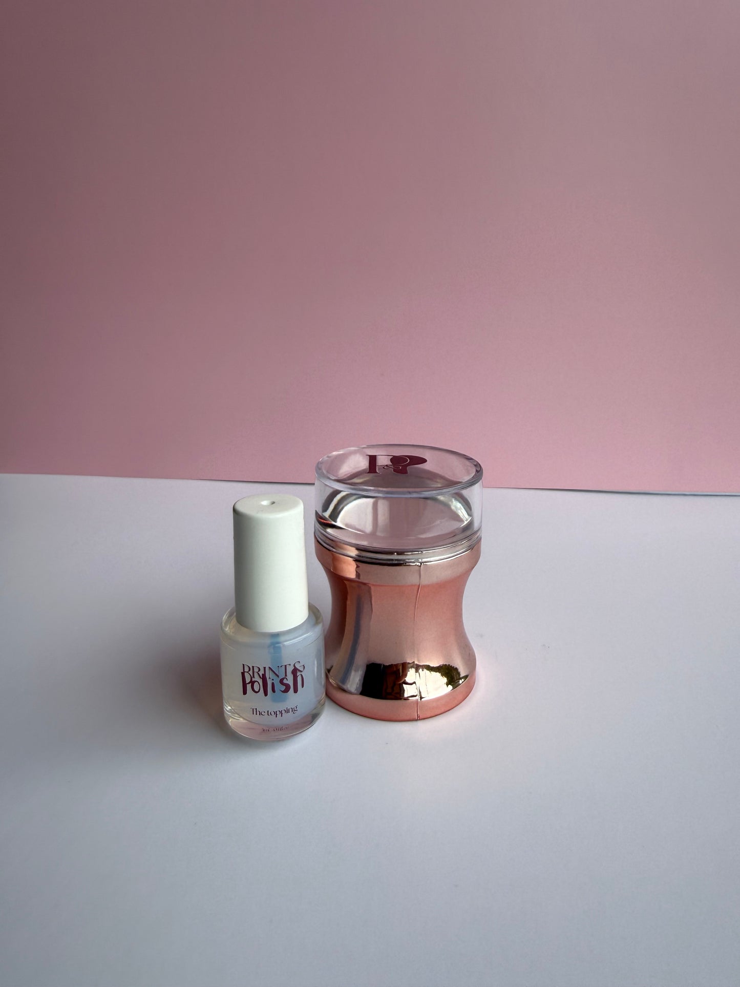 Clear nail polish bottle with a silicone stamper for easy application